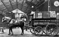 Horse dray loaded with Manchester goods.